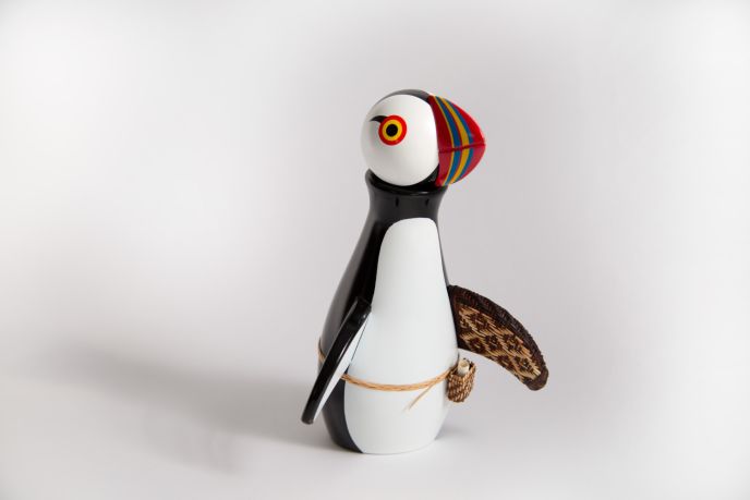 The broken flipper of Toy puffin 